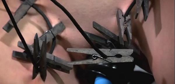  Wooden peg clamped subs body punished